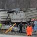 A trailer is pulled upright after  flipping onto its side and and pinning another vehicle against the guardrails on south U.S. 23 north of Six Mile Road in Northfield Township on Monday, March 11, 2013. Melanie Maxwell I AnnArbor.com